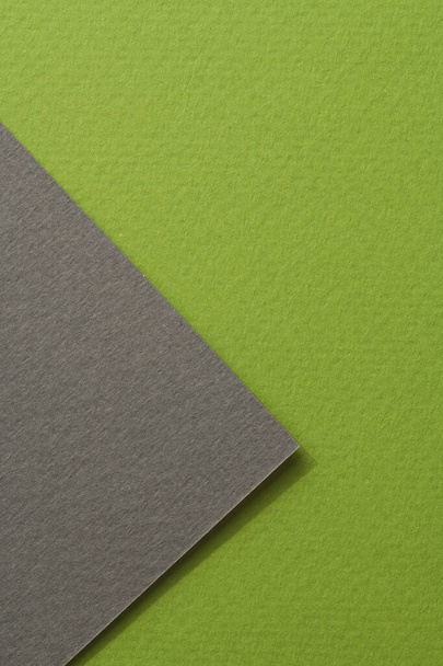 Rough kraft paper background, paper texture black green colors. Mockup with copy space for text - Foto, imagen