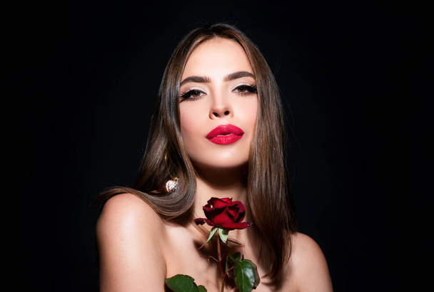 Sexy woman lips with red lipstick and beautiful red rose on black - Foto, Imagem