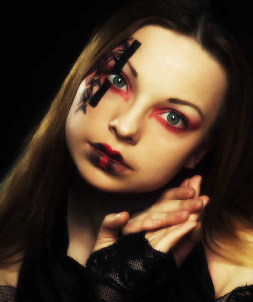 young woman with creative face-art - Foto, Bild