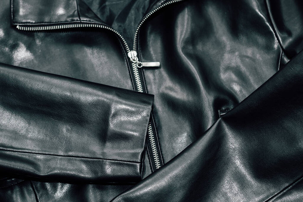 Black texture eco soft leather, fashionable jacket. - Foto, imagen