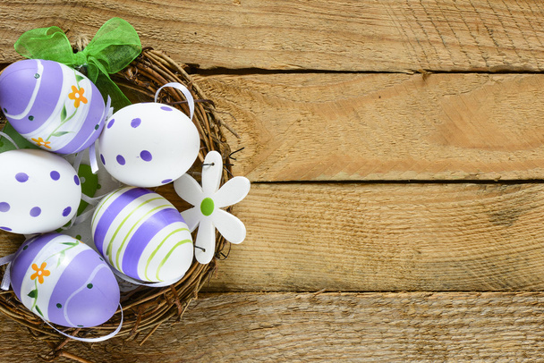 Decorated Easter eggs in nest - Photo, Image