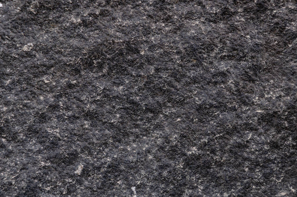 Granite surface as background. Grunge stone texture. Basalt. Rock surface background - Photo, Image