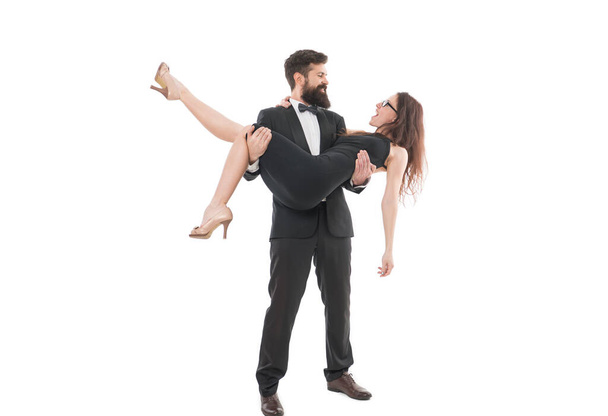 Celebrate marriage. Happy wife husband in love. Sincere love. Carry on hands. Sexy girl enjoy attention. Man well groomed guy in tuxedo carry woman. Love from first sight. Wedding party. She said yes. - Φωτογραφία, εικόνα