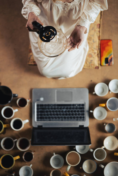 Recycling, deadline, awake concept. Laptop, many cups of coffee. View from above. - Zdjęcie, obraz