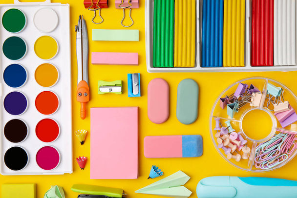 Many different school stationery on yellow background, flat lay. Back to school - Photo, Image