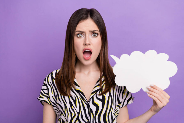 Photo of young woman open mouth hold paper bubble cloud surprised dissatisfied empty space wtf speech isolated on violet color background. - Foto, Imagem