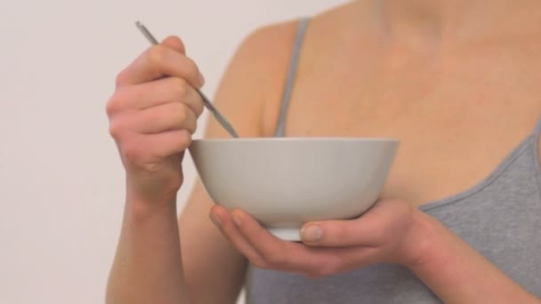 Woman eating yoghurt - Felvétel, videó