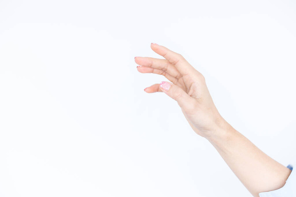 Beautiful asian woman hand isolated on white background, Empty open woman hand on white background, Female hand on white background. - Valokuva, kuva