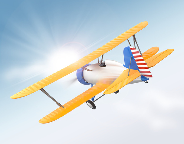 Yellow and blue biplane flying in the sky - Photo, Image