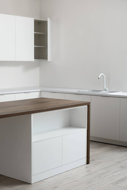Interior of light kitchen with white drawers - Foto, immagini