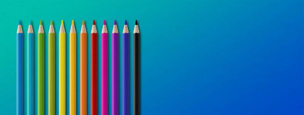 Wooden colored pencil set isolated on blue. Panoramic banner background. - Foto, afbeelding