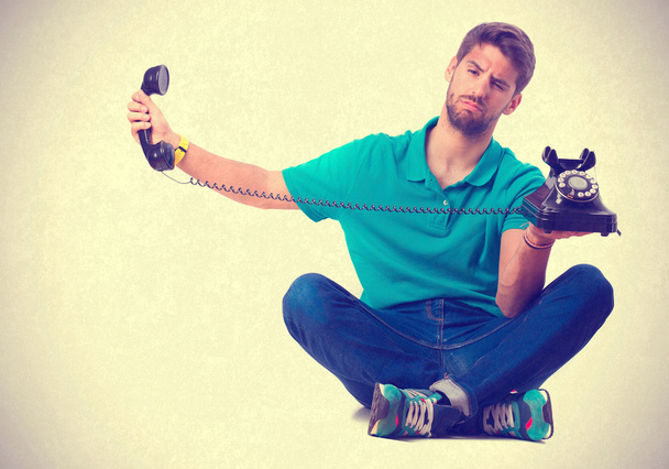 guy holding a telephone - Foto, Bild