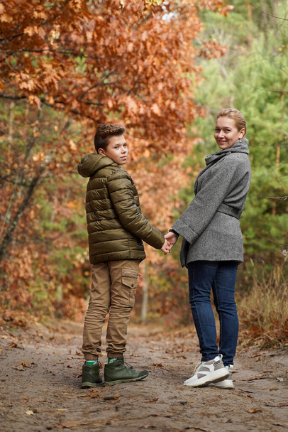Happy mother and son in the forest. Family values - Fotografie, Obrázek