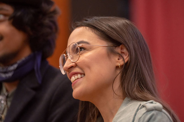 Alexandria Ocasio-Cortez Town Hall. May 26, 2023, New York, New York, USA: U.S. Representative Alexandria Ocasio-Cortez meets and greets attendees at a town hall meeting at the Corona Arts and Sciences Academy on May 26, 2003 - Foto, Imagen