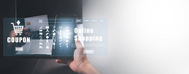 Businessman using a laptop with online shopping concept, marketplace website with virtual interface of online Shopping cart part of the network, Online shopping business with selecting shopping cart. - Foto, Imagen