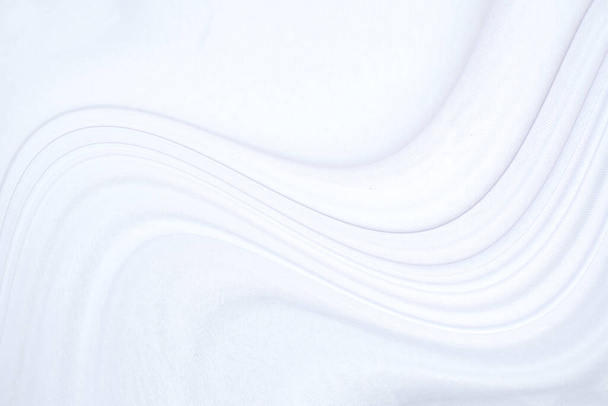 Pürüzsüz beyaz ipek ya da saten lüks kumaş dokusu düğün arka planı olarak kullanılabilir. Lüks arkaplan tasarımı - Fotoğraf, Görsel