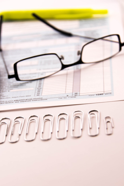 Tax preparation supplies, reading glasses and tax forms - Photo, Image