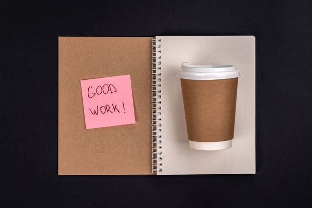 Paper disposable cup, notebook and bright stick, top view. Good job concept. - Fotografie, Obrázek