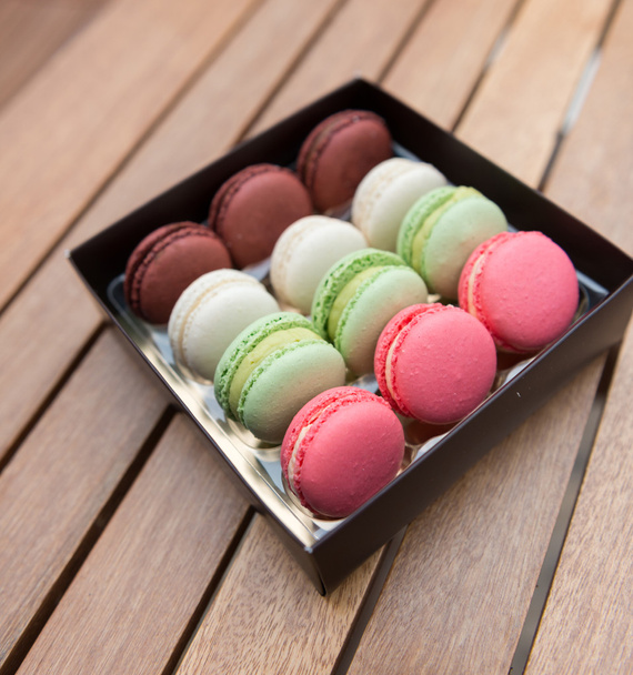 Macarons on a gift box - Photo, Image