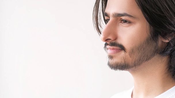 Serious expression. Masculine calmness. Profile attractive dark haired guy with mustache bristle calm face isolated on white empty space background. - Fotoğraf, Görsel