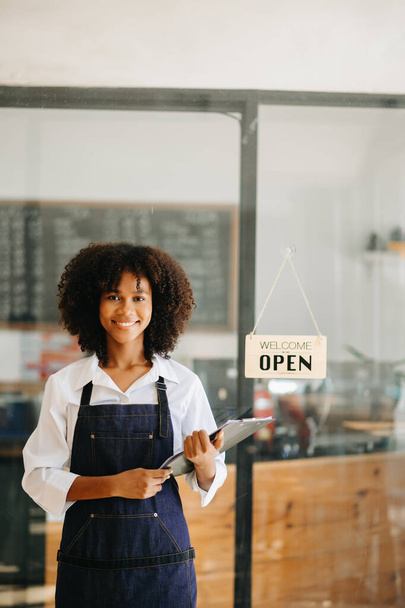Startup successful small business owner  woman stand   in cafe  - Foto, Imagen