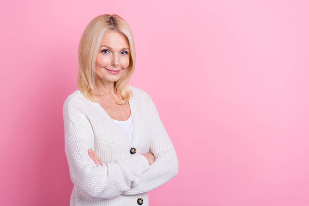 Portrait of positive successful person crossed arms empty space blank isolated on pink color background. - Valokuva, kuva