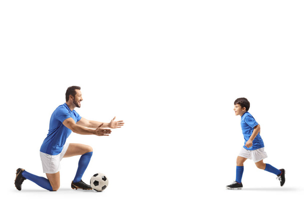 Kid running to hug a football player isolated on white backgroun - Photo, Image