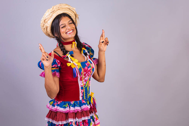 brazilian woman with clothes from festa de so joo, festa junina.  - Фото, изображение