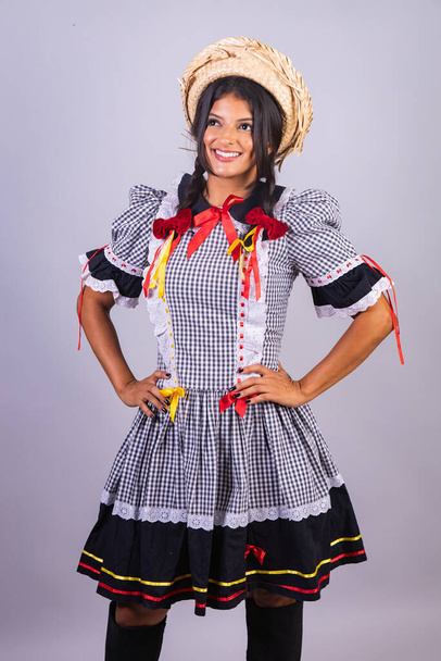 brazilian woman with clothes from festa de so joo, festa junina.  - 写真・画像