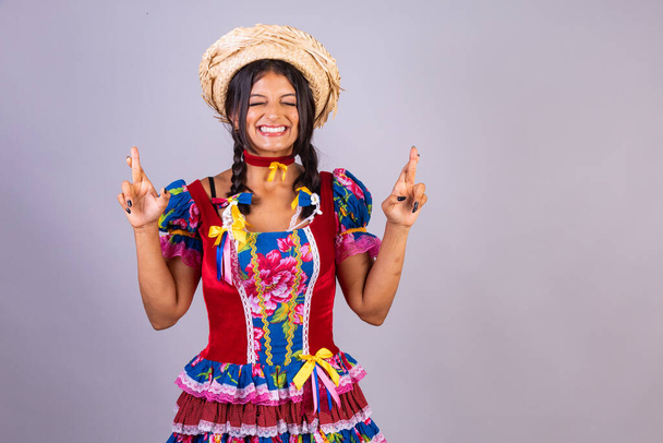 brazilian woman with clothes from festa de so joo, festa junina.  - Фото, изображение