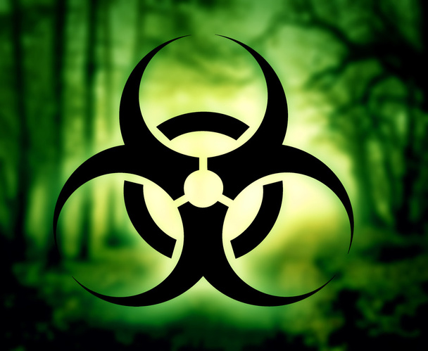 Biohazard symbol with glowing forest - Photo, Image