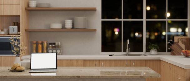 Notebook bílý displej maketa na mramorovém kuchyňském ostrově nebo pultu v moderní minimální skandinávské kuchyni. Koncept domácího pracovního prostoru. 3D vykreslení, 3D ilustrace - Fotografie, Obrázek