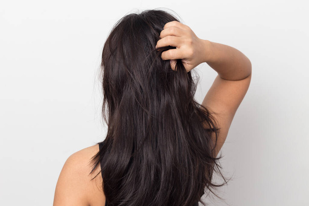 Women itching scalp damaged hair, Haircare concept. - Zdjęcie, obraz