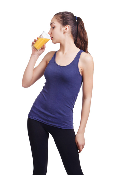 Pretty woman drinking a health drink - Фото, изображение