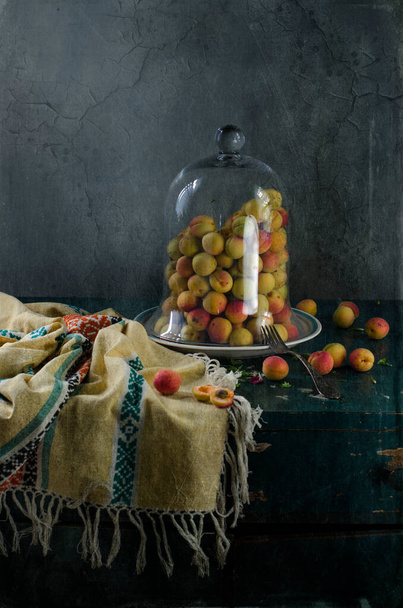 still life with a bunch of fruits and vegetables on a wooden background - Foto, Imagen