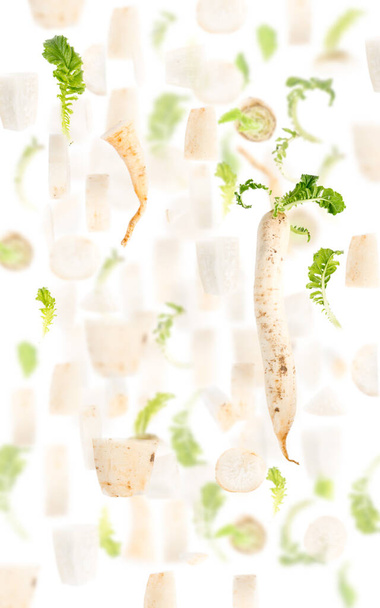 Abstract background made of Parsley vegetable pieces, slices and leaves isolated on white. - Fotografie, Obrázek