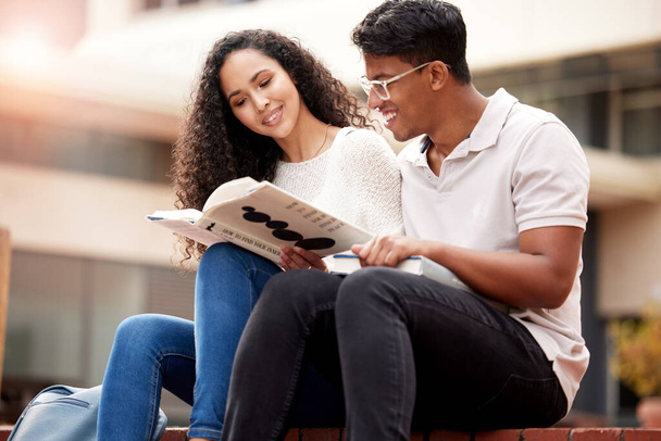 Study, university and man and woman with book on campus for learning, knowledge and studying. Education, friendship and male and female students with textbook for information, research and college. - Photo, Image