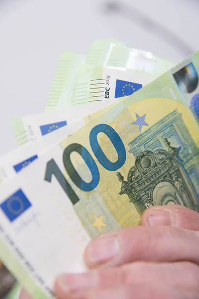 one hundred euro banknote, currency in the european union, business and finances - Foto, Imagen