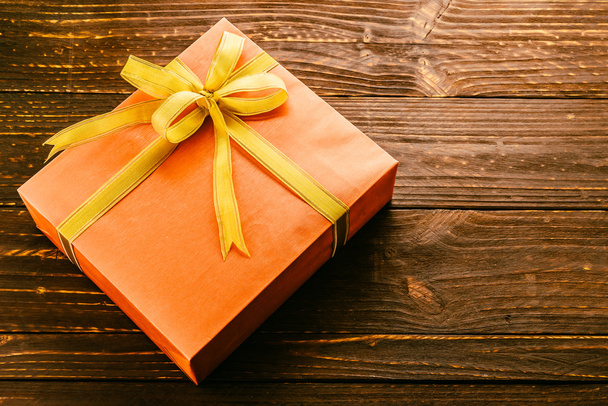 Gift box on wooden background - Photo, Image