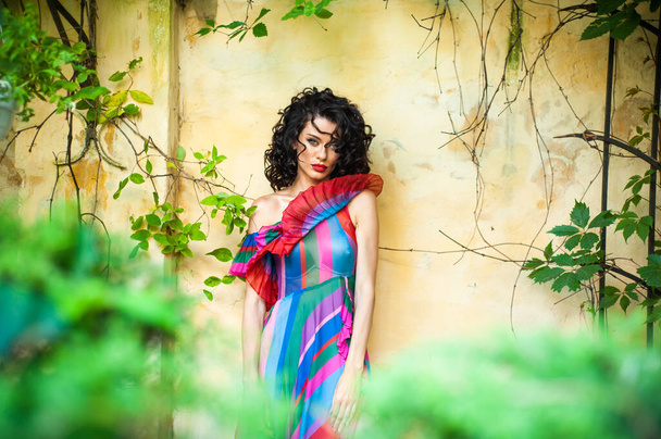 woman in colorful dress  - Фото, изображение