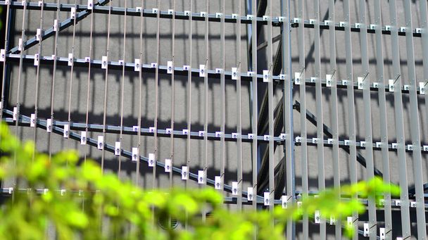 Metal facade of the building. Details of aluminum facade and aluminum panels on  building. Cladding steel frame panels. - Foto, Imagen