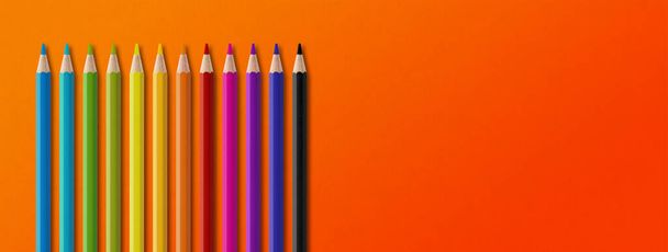 Wooden colored pencil set isolated on orange. Panoramic banner background. - Φωτογραφία, εικόνα