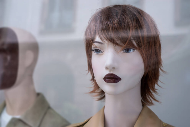 Closeup of black hair mannequin in a women fashion store showroom - Photo, Image