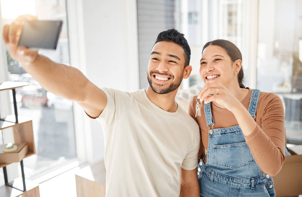 Selfie, new home and happy couple, keys and mortgage success, live stream apartment or real estate. Property investment, moving house and excited women with partner, photography and profile picture. - Foto, immagini