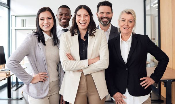 Happy, confidence and group of business people in the office for teamwork, collaboration and diversity. Happiness, smile and professional employees standing with a corporate manager in the workplace - Photo, Image