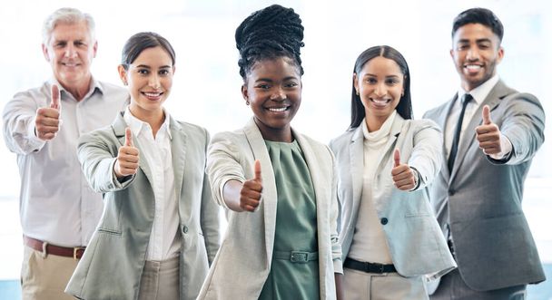 Business people, portrait and thumbs up for winning, diversity or teamwork success at office. Black woman with diverse happy group with thumb emoji, yes sign or like for team approval at workplace. - Foto, immagini