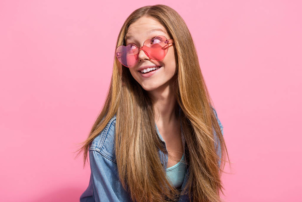 Photo of cheerful dreamy lovely lady wear stylish clothes sunglass looking up empty space seasonal sale isolated on pink color background. - Photo, Image