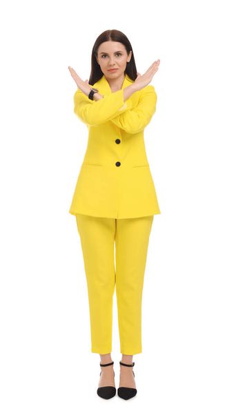 Beautiful businesswoman in yellow suit on white background - Zdjęcie, obraz