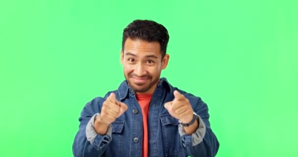 Man, come here hands and smile by green screen with excited face, happy and call by background. Young male, welcome and pointing in portrait with mockup invitation with happiness by studio backdrop. - Záběry, video