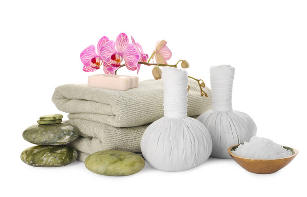 Beautiful spa composition with different care products and flowers on white background - Foto, Imagem